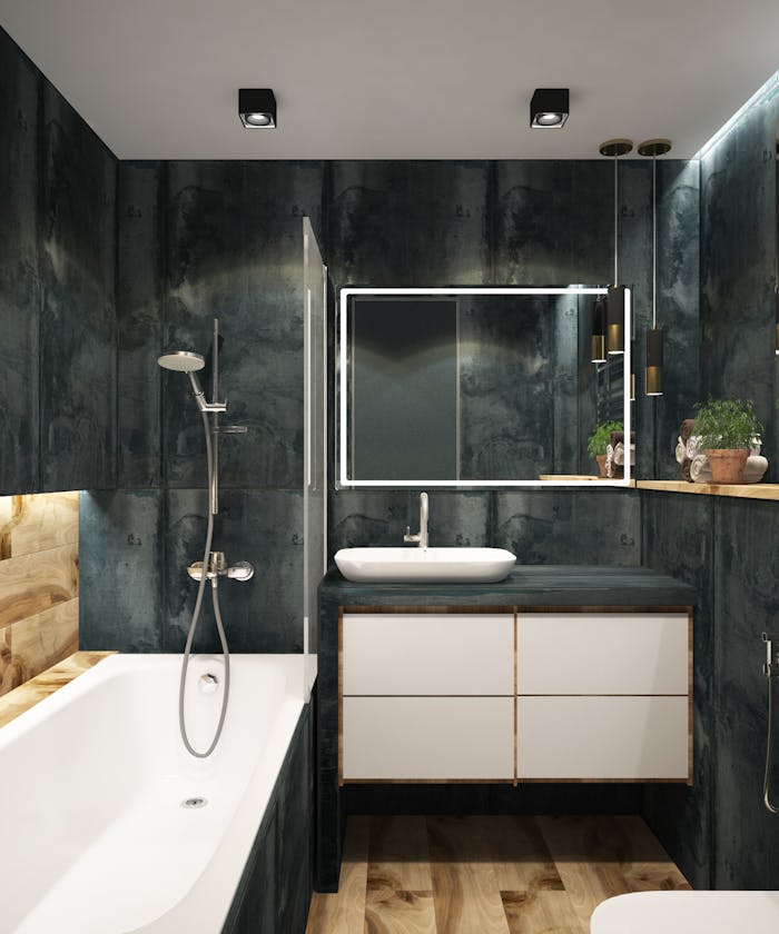 Service A contemporary bathroom showcasing black marble walls, clean lines, and modern fixtures, exuding luxury and style.